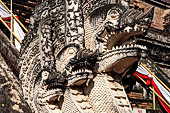 Chiang Mai - The Wat Chedi Luang. The massive chedi heavily damaged by an earthquake. The four staircases are protected by recentely restored guardian naga. 